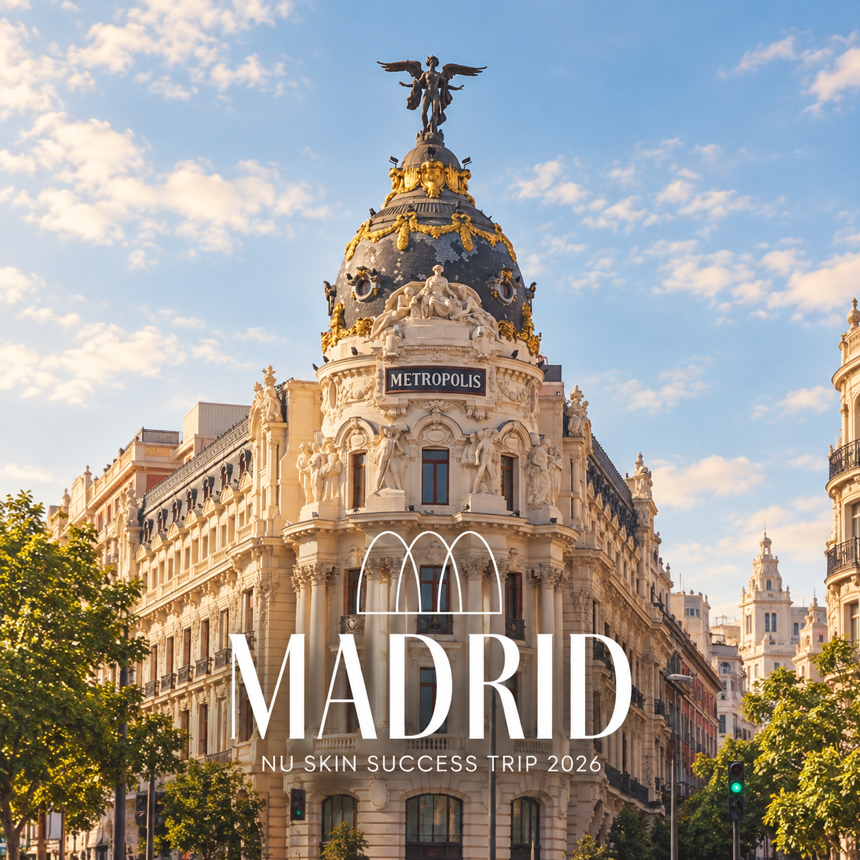 timeless architecture, golden details, and city-centre elegance. The Metropolis Building in Madrid under a blue sky with large white Madrid typography.